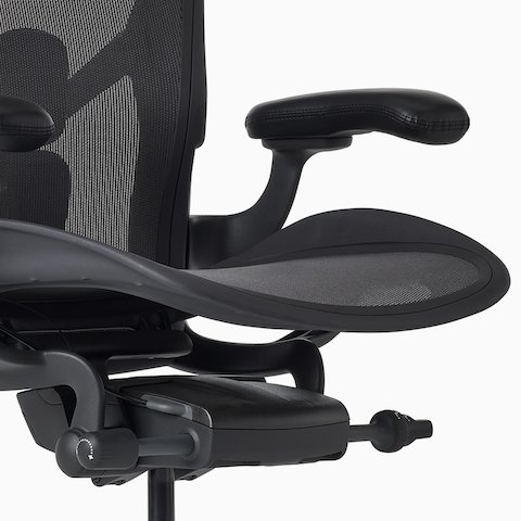 Close-up, front-angle view of an Aeron ESD Chair in size B with a granite frame and suspension. Close-up, front-angle view of an Aeron ESD Chair in size B with a granite frame and suspension.