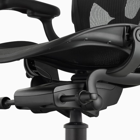 A close-up view of the adjustment options on a black Aeron Stool. A close-up view of the adjustment options on a black Aeron Stool.
