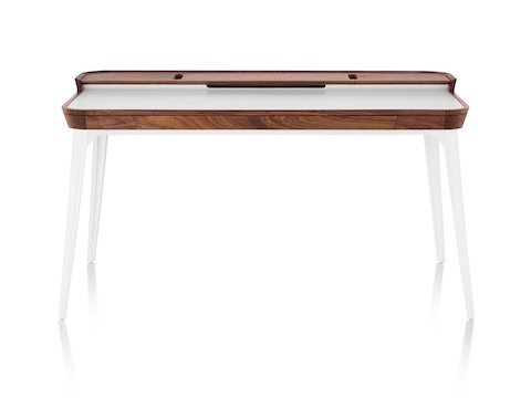 Front view of an Airia Desk in white with dark wood trim and white legs. Front view of an Airia Desk in white with dark wood trim and white legs.