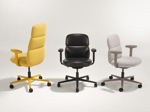 A group of three Asari chairs by Herman Miller all with height adjustable arms. Included in this group are a mid back light brown chair, a high back yellow chair and a mid back black leather chair. A group of three Asari chairs by Herman Miller all with height adjustable arms. Included in this group are a mid back light brown chair, a high back yellow chair and a mid back black leather chair.