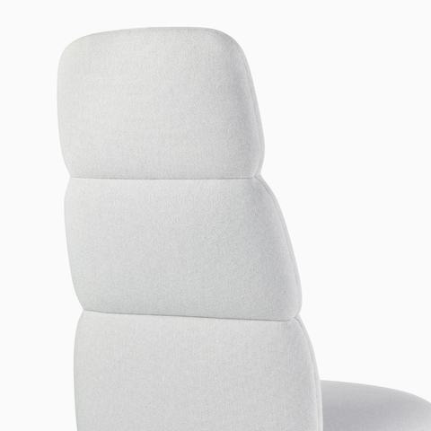 Detail view of a high-back Asari chair by Herman Miller in light grey without arms. Detail view of a high-back Asari chair by Herman Miller in light grey without arms.
