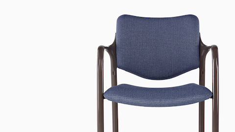 Purple Aside Chair with brown arms, viewed from the front. Purple Aside Chair with brown arms, viewed from the front.