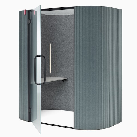 An angle view of a Bay Work Pod Pro with the door ajar and the occupancy sensor lit. An angle view of a Bay Work Pod Pro with the door ajar and the occupancy sensor lit.