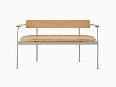 A Betwixt Bench with oak seat, backrest, and arms with a grey frame. A Betwixt Bench with oak seat, backrest, and arms with a grey frame.