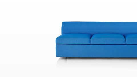 Bevel Sofa with bright blue upholstery. Bevel Sofa with bright blue upholstery.