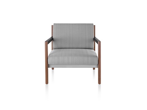 A gray Brabo lounge chair with wood legs and black arms, viewed from the front. A gray Brabo lounge chair with wood legs and black arms, viewed from the front.