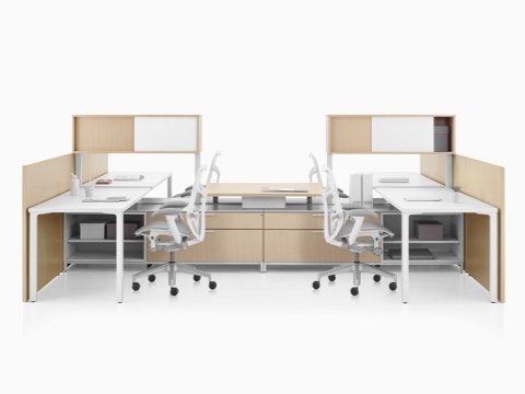A Canvas Dock workstation in light wood and white with grey Mirra 2 office chairs. A Canvas Dock workstation in light wood and white with grey Mirra 2 office chairs.