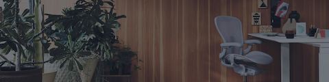 A home office full of houseplants, with the Aeron Chair pulled into the Renew Sit-To-Stand Desk in the right corner. A home office full of houseplants, with the Aeron Chair pulled into the Renew Sit-To-Stand Desk in the right corner.