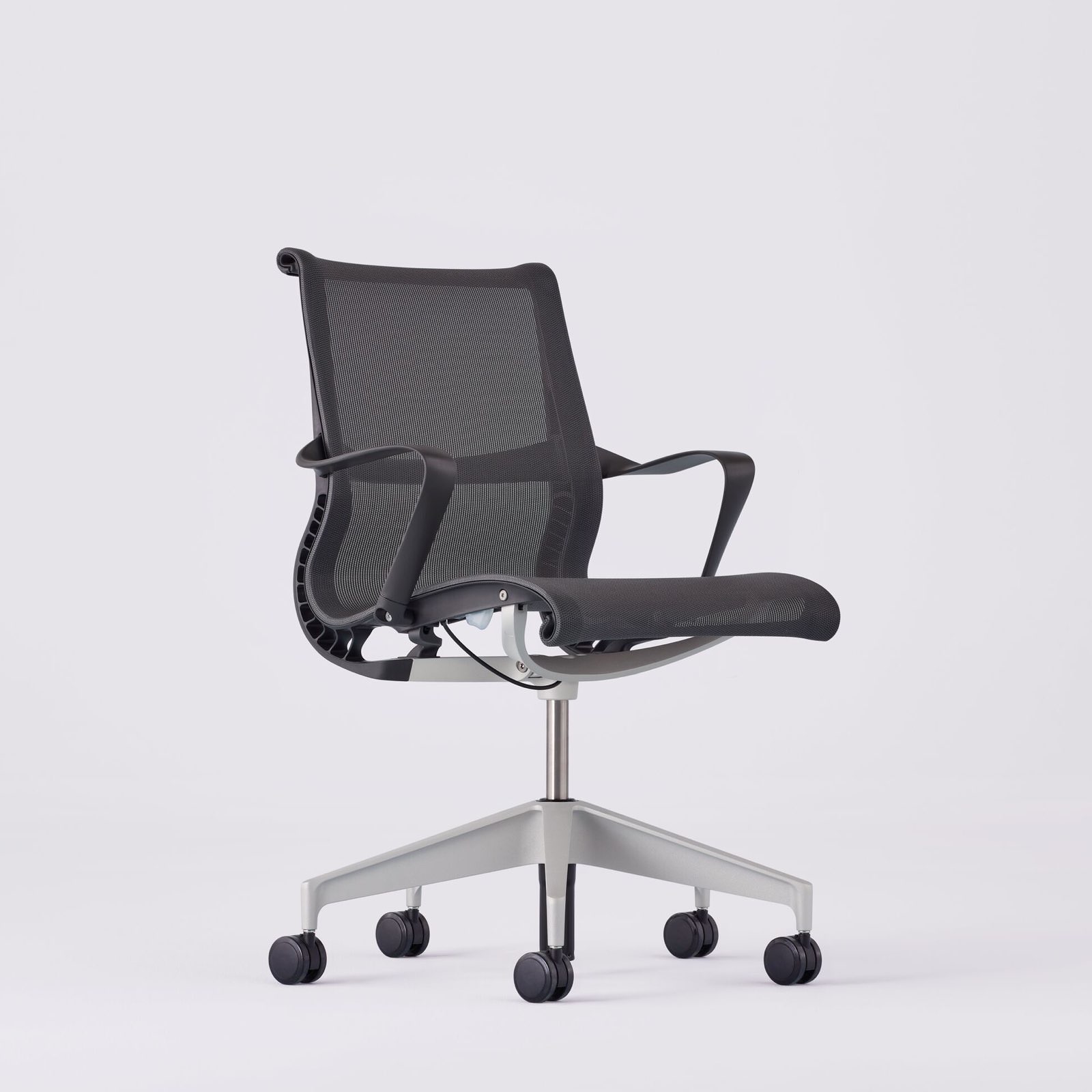 A full view of the Setu Chair swiveled 45 degrees to the right. A full view of the Setu Chair swiveled 45 degrees to the right.