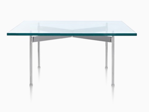 A rectangular glass-top Claw Table, showing the claw-like metal cross brace. A rectangular glass-top Claw Table, showing the claw-like metal cross brace.