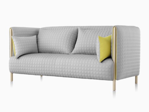 Angled front view of a light gray ColourForm sofa. Angled front view of a light gray ColourForm sofa.