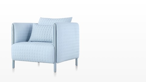 A light blue ColourForm lounge chair, viewed from a 45-degree angle. A light blue ColourForm lounge chair, viewed from a 45-degree angle.