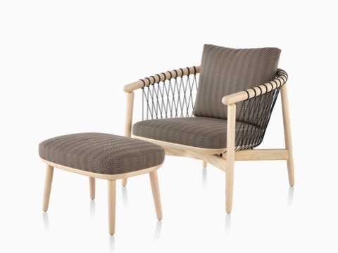Crosshatch Chair and Ottomon with blonde wood frame and dark tan and black herringbone fabric upholstery. Crosshatch Chair and Ottomon with blonde wood frame and dark tan and black herringbone fabric upholstery.