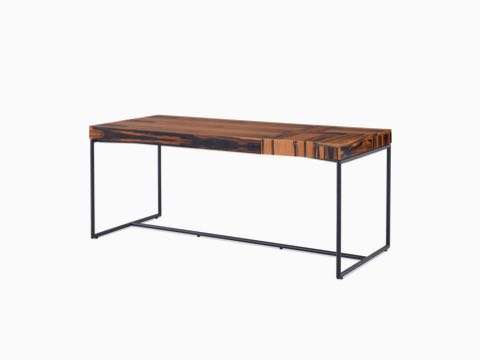 A Domino Desk with wood top and metal base. A Domino Desk with wood top and metal base.