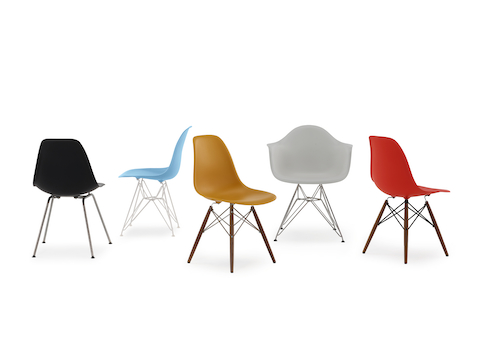 Five Eames Molded Plastic side and armchairs in white, brown, blue, red, and black, showing the various base options. Five Eames Molded Plastic side and armchairs in white, brown, blue, red, and black, showing the various base options.