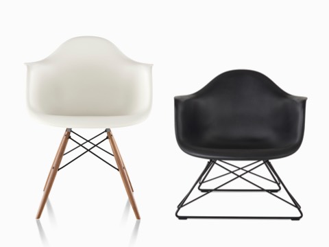 Two Eames Molded Plastic Armchairs, one with a low wire base and one with a dowel base. Two Eames Molded Plastic Armchairs, one with a low wire base and one with a dowel base.