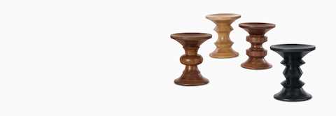 Four Eames Turned Stools in different shapes with ebonized ash, white oak, and walnut finishes. Four Eames Turned Stools in different shapes with ebonized ash, white oak, and walnut finishes.