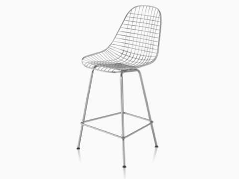 Upper half of a silver Eames Wire Stool, viewed from a 45-degree angle. Upper half of a silver Eames Wire Stool, viewed from a 45-degree angle.