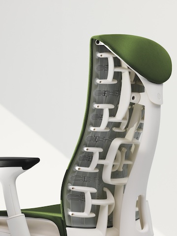 Three-quarter rear view of a green Embody office chair, showing back support. Three-quarter rear view of a green Embody office chair, showing back support.