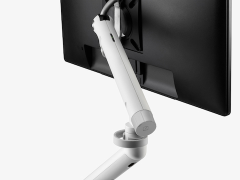 A back angled view of a black monitor attached to a Flo Monitor Arm including the optional Tool-less adjuster. A back angled view of a black monitor attached to a Flo Monitor Arm including the optional Tool-less adjuster.