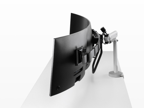 Silver triple Flo X monitor arm set up, viewed from the side. Silver triple Flo X monitor arm set up, viewed from the side.