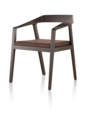 Full Twist Guest Chair with a dark wood finish and brown seat pad, viewed from a 45-degree angle. Full Twist Guest Chair with a dark wood finish and brown seat pad, viewed from a 45-degree angle.