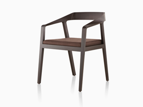 Full Twist Guest Chair with a dark wood finish and brown seat pad, viewed from a 45-degree angle. Full Twist Guest Chair with a dark wood finish and brown seat pad, viewed from a 45-degree angle.