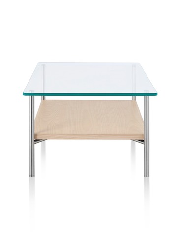 A Layer glass top occasional table with a light wood lower shelf. A Layer glass top occasional table with a light wood lower shelf.