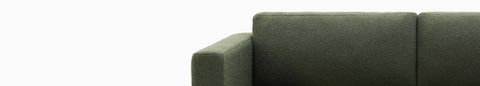 Front view of three seater Lispenard Sofa, 17 inches in dark green textile and 6 inch walnut legs. Front view of three seater Lispenard Sofa, 17 inches in dark green textile and 6 inch walnut legs.