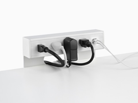 Rear view of a surface-attached Logic Mini Vine power port, showing the main power connection and cable management features. Rear view of a surface-attached Logic Mini Vine power port, showing the main power connection and cable management features.