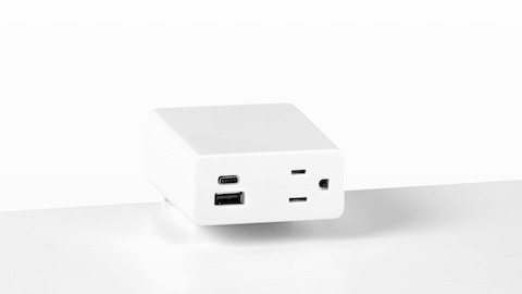 Close up image of a white surface mounted Logic Mini with two USB ports and one simplex receptacle. Close up image of a white surface mounted Logic Mini with two USB ports and one simplex receptacle.