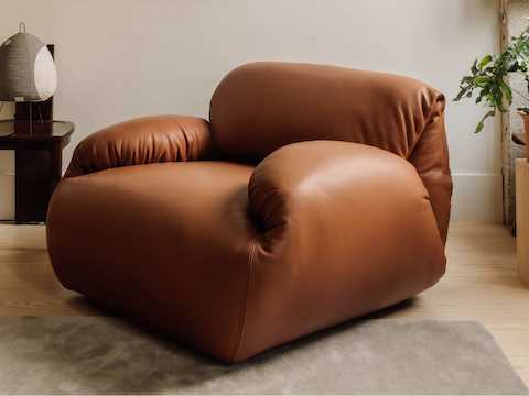 Luva Modular Sofa, armchair in a living room. Luva Modular Sofa, armchair in a living room.