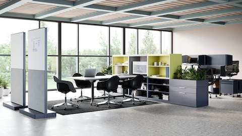Blue and lime green Meridian Storage components, Headway Conference Table and OE1 Agile Walls in a collaborative setting, with a blue OE1 Micro Pack in the background. Blue and lime green Meridian Storage components, Headway Conference Table and OE1 Agile Walls in a collaborative setting, with a blue OE1 Micro Pack in the background.