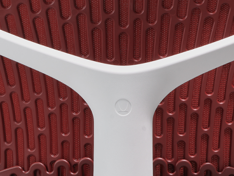 Rear view of a Mirra 2 chair with a Butterfly back in cordovan and alpine frame. Rear view of a Mirra 2 chair with a Butterfly back in cordovan and alpine frame.