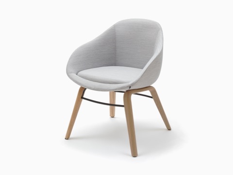 A NaughtOne Always Side Chair upholstered in brown leather with a black steel 4-star base, viewed from the side. A NaughtOne Always Side Chair upholstered in brown leather with a black steel 4-star base, viewed from the side.