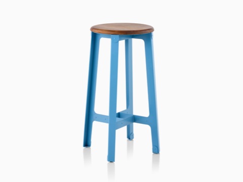 Construct Barstool with a wood lacquered seat and a blue hard-wearing polyester powdered steel base, viewed at an angle. Construct Barstool with a wood lacquered seat and a blue hard-wearing polyester powdered steel base, viewed at an angle.