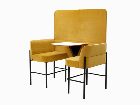 Two-seat bar-height Hue Booth with Screen, upholstered in yellow velvet with black legs and white table top, viewed from an angle. Two-seat bar-height Hue Booth with Screen, upholstered in yellow velvet with black legs and white table top, viewed from an angle.