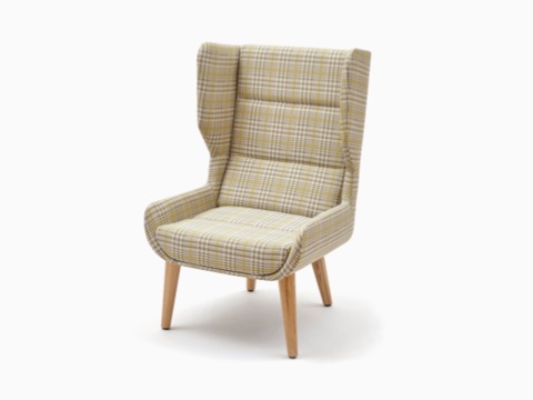 An off-white NaughtOne Hush Chair with a gray and yellow pattern and wooden base, viewed at an angle. An off-white NaughtOne Hush Chair with a gray and yellow pattern and wooden base, viewed at an angle.