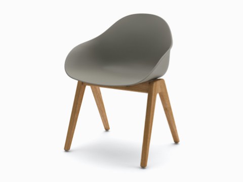 Three-quarter view of a grey Ruby Wood Chair on oak legs. Three-quarter view of a grey Ruby Wood Chair on oak legs.