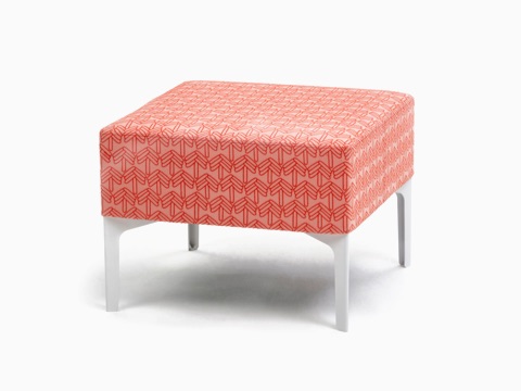 An orange patterned single Symbol Bench with white legs, viewed at an angle. An orange patterned single Symbol Bench with white legs, viewed at an angle.