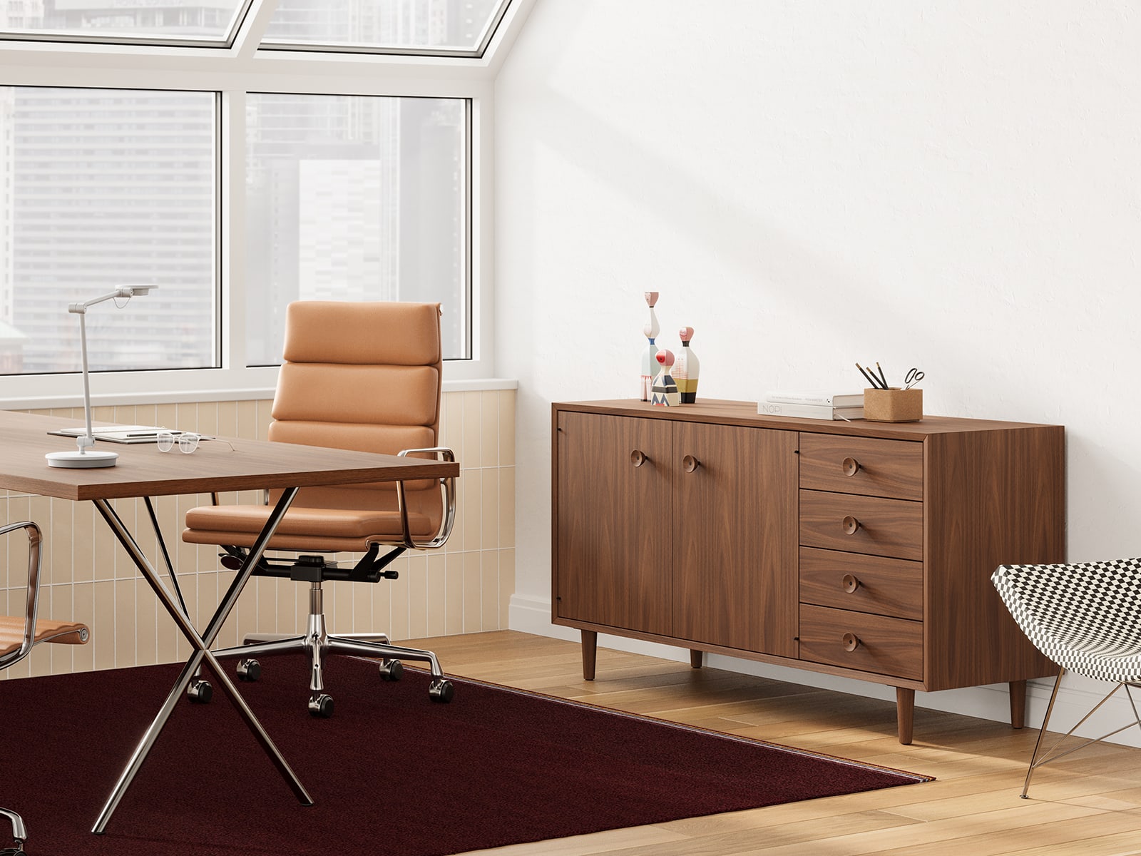 Private office featuring Eames Soft Pad, Executive Height in tan leather and Nelson Basic Credenza in walnut. Private office featuring Eames Soft Pad, Executive Height in tan leather and Nelson Basic Credenza in walnut.