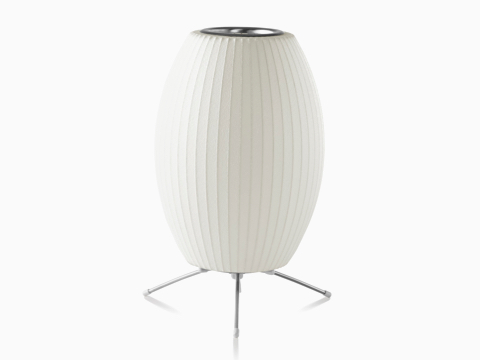 A white Nelson Cigar Tripod Lamp. A white Nelson Cigar Tripod Lamp.