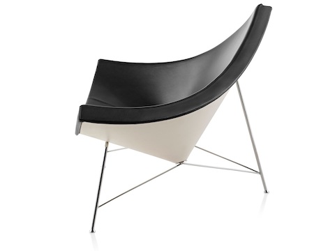 Profile view of a black leather Nelson Coconut Lounge Chair. Profile view of a black leather Nelson Coconut Lounge Chair.