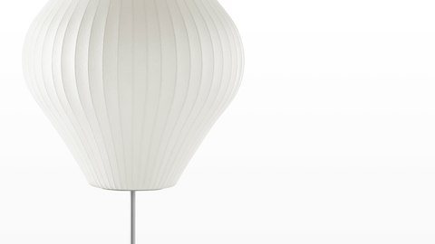 Close view of the white shade on a Nelson Pear Lotus Floor Lamp. Close view of the white shade on a Nelson Pear Lotus Floor Lamp.
