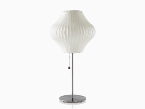 A white Nelson Pear Lotus Table Lamp. A white Nelson Pear Lotus Table Lamp.