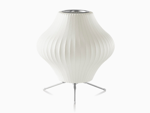 A white Nelson Pear Tripod Lamp. A white Nelson Pear Tripod Lamp.