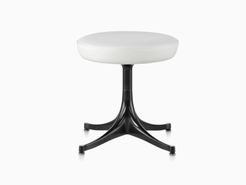 Nelson Pedestal Stool with a white leather seat and black base. Nelson Pedestal Stool with a white leather seat and black base.