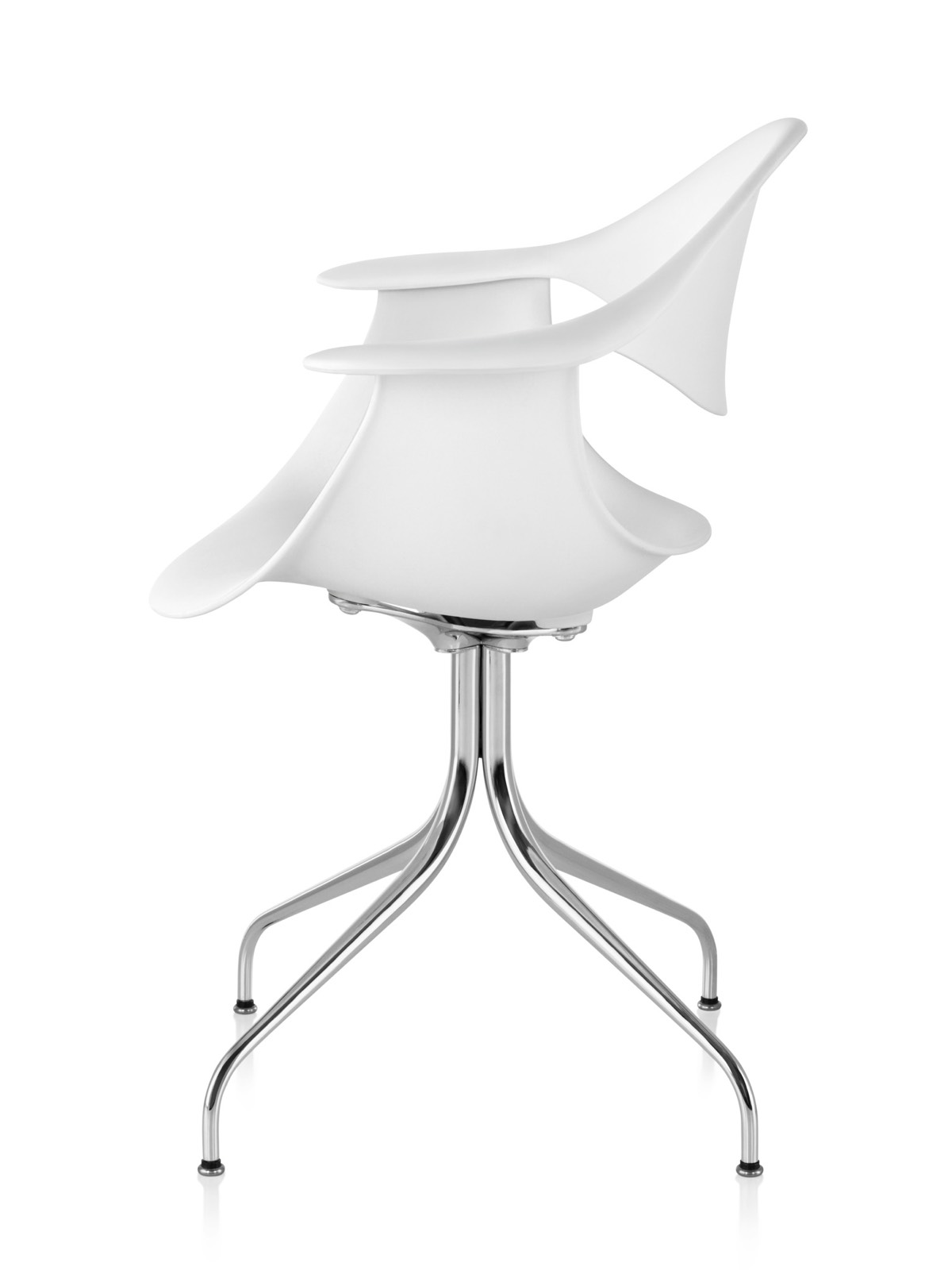 Profile view of a white Nelson Swag Leg Armchair, showing the molded plastic shell and curved steel legs. Profile view of a white Nelson Swag Leg Armchair, showing the molded plastic shell and curved steel legs.