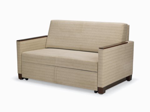 Nemschoff Beaumont Sleep Chair and Settee in tan upholstery, viewed at an angle. Nemschoff Beaumont Sleep Chair and Settee in tan upholstery, viewed at an angle.