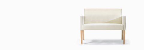 A front view of a Brava 862 plus chair in white textile with upholstered arms and maple legs. A front view of a Brava 862 plus chair in white textile with upholstered arms and maple legs.